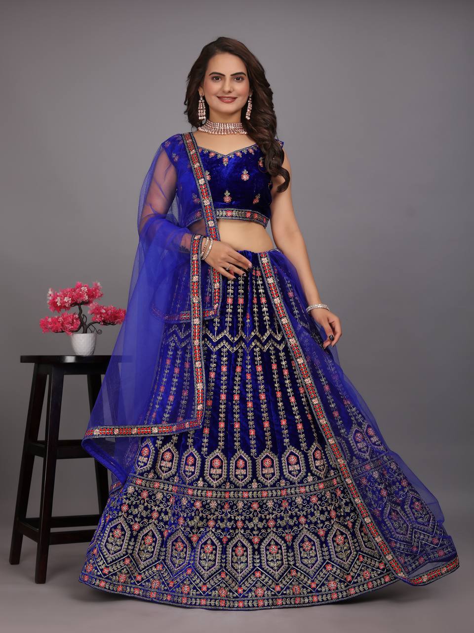 Navy Blue Colour Embroidered Attractive Party Wear Velvet Lehenga choli has a Regular-fit and is Made From High-Grade Fabrics And Yarn.L48