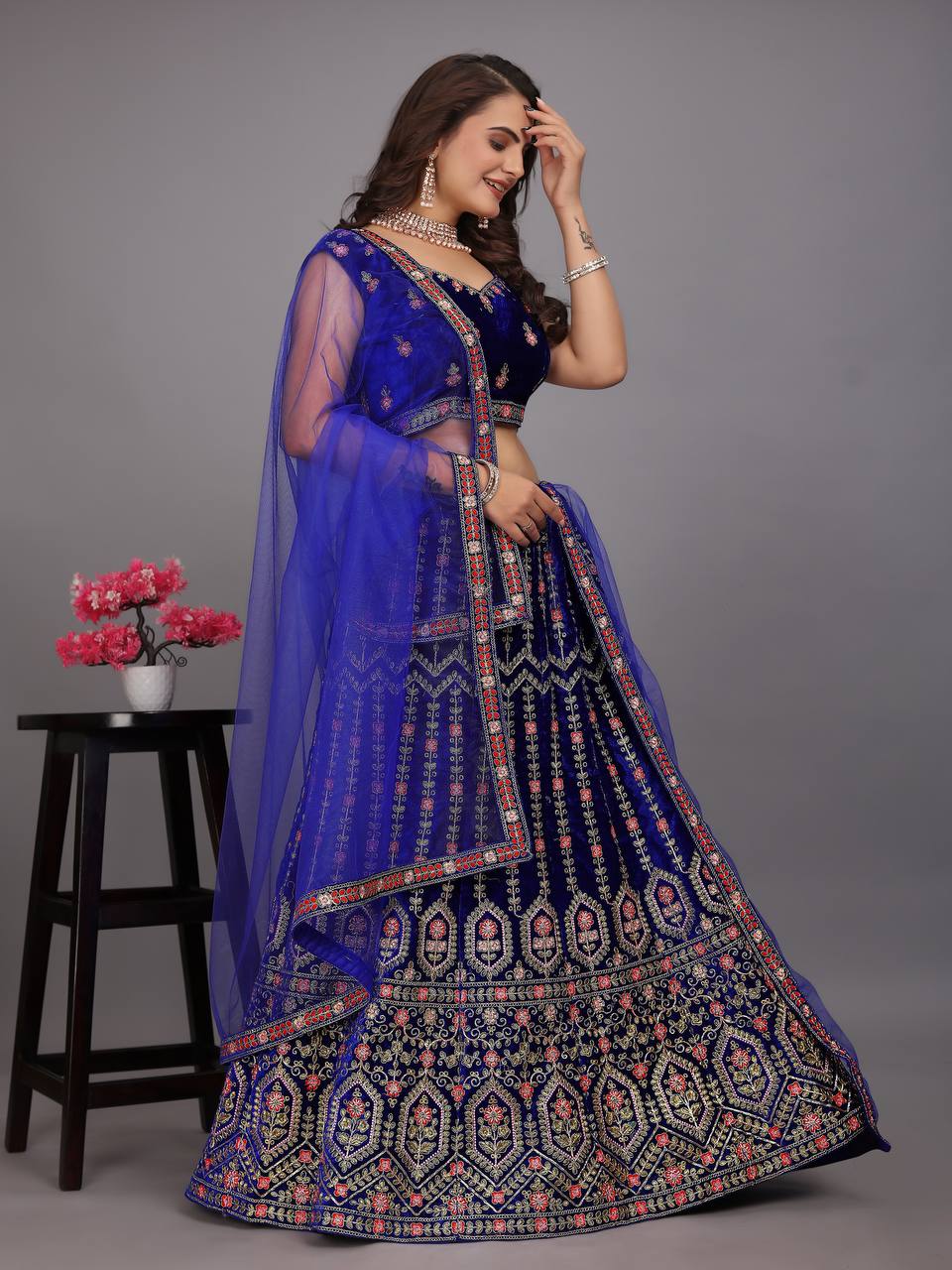 Navy Blue Colour Embroidered Attractive Party Wear Velvet Lehenga choli has a Regular-fit and is Made From High-Grade Fabrics And Yarn.L48