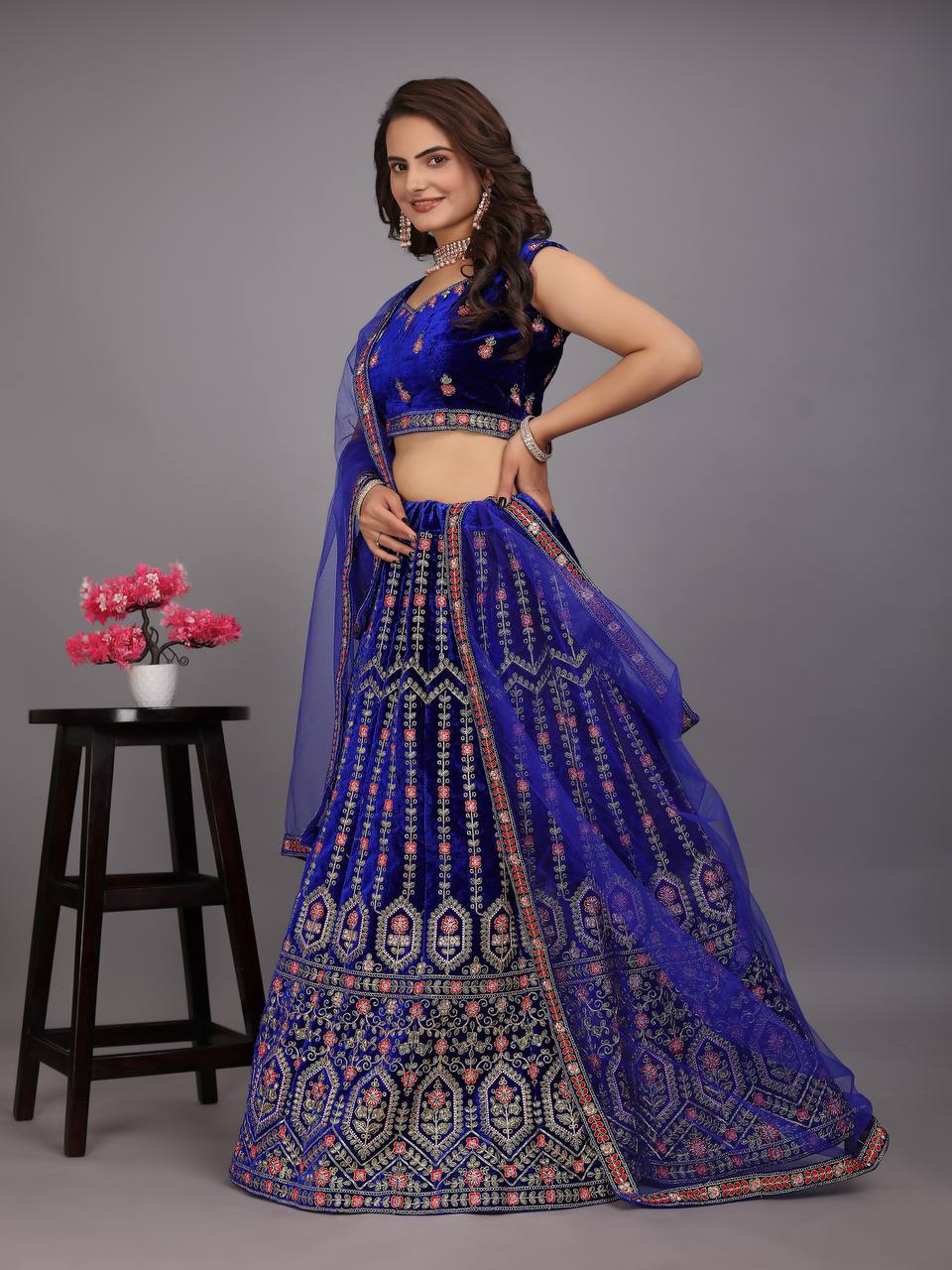 Navy Blue Colour Embroidered Attractive Party Wear Velvet Lehenga choli has a Regular-fit and is Made From High-Grade Fabrics And Yarn.L48