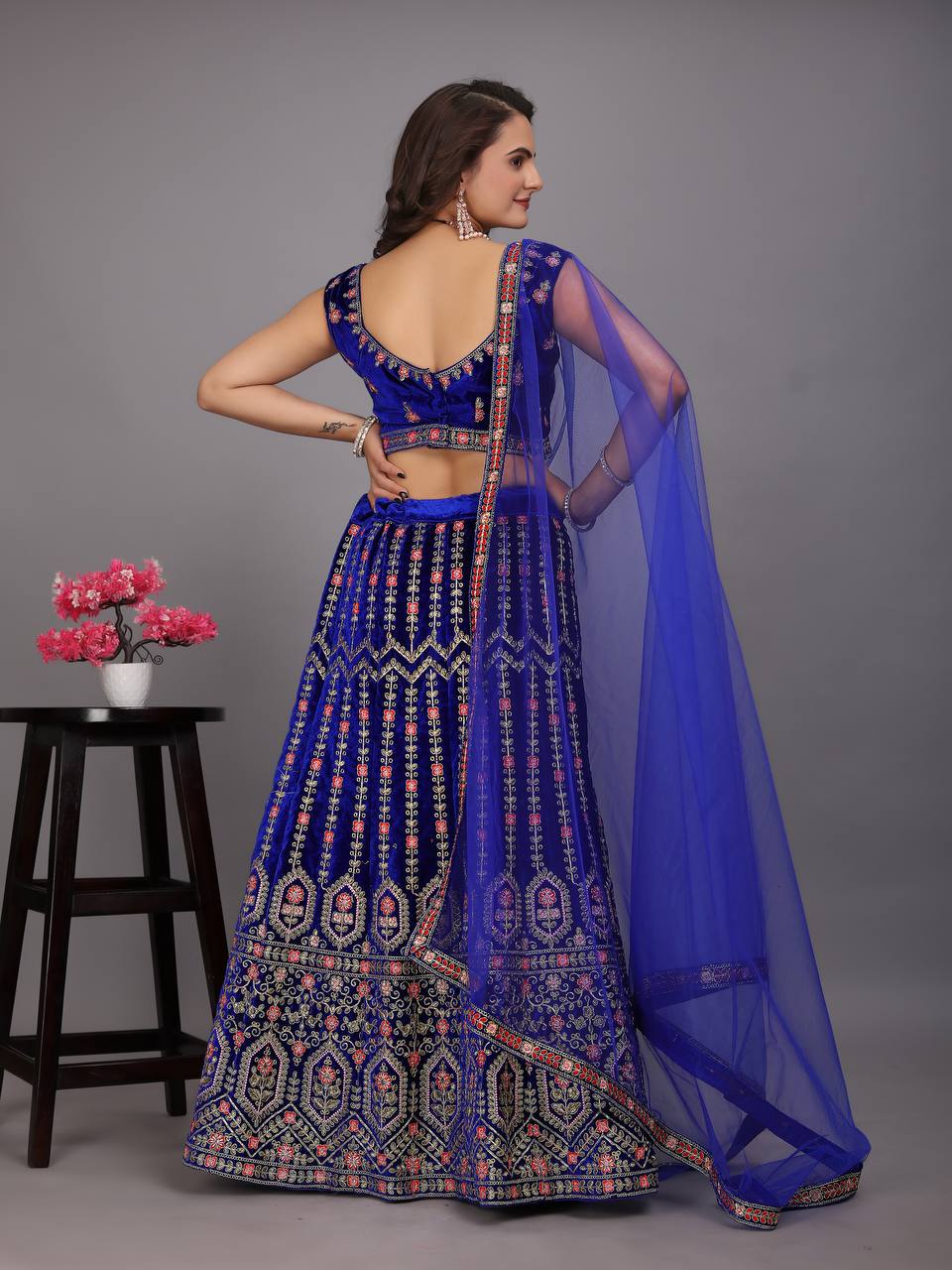 Navy Blue Colour Embroidered Attractive Party Wear Velvet Lehenga choli has a Regular-fit and is Made From High-Grade Fabrics And Yarn.L48