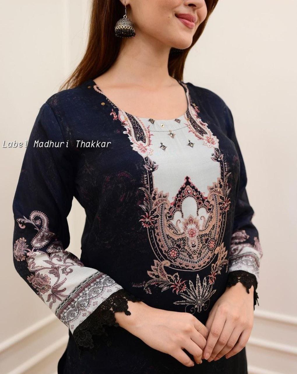 Ivory and Black Pakistani Suits made from Pure Muslin fabric with digital prints and lace detailing certainly sound like a fashionable choice for upcoming occasions. The comfort and style they offer can make them a great addition to your wardrobe.7128